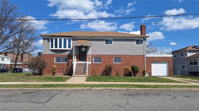 Attached, Exterior, Facade, Brick Facade, Raised Ranch