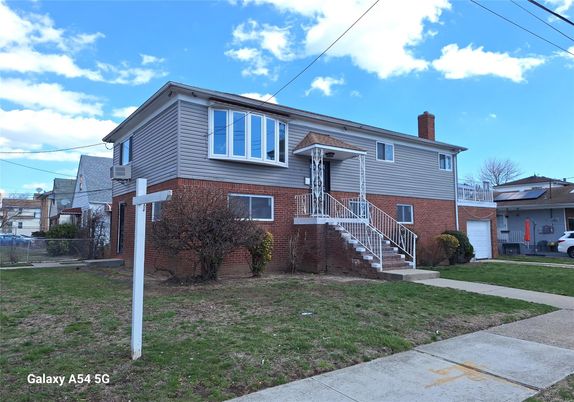 Attached, Exterior, Facade, Brick Facade, Raised Ranch