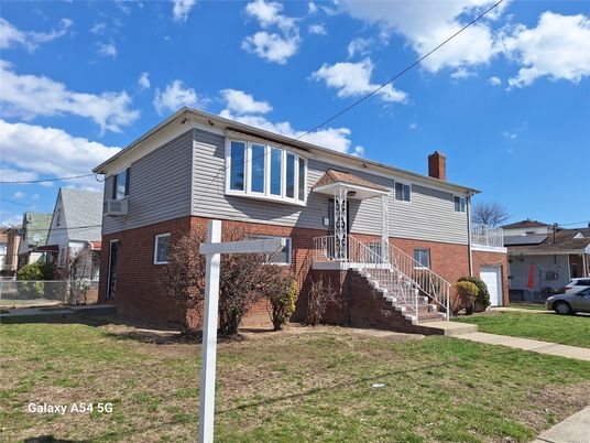 Exterior, Facade, Brick Facade, Raised Ranch