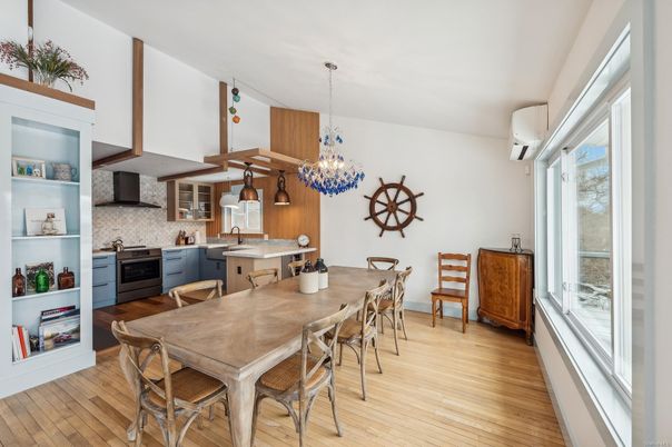 Chandelier, Dining room, Interior, Kitchen, Pendant Lights, Stainless Steel Appliances, Wooden Beams, Wood Texture Flooring