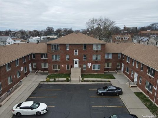 Exterior, Facade, Brick Facade, Condo Building