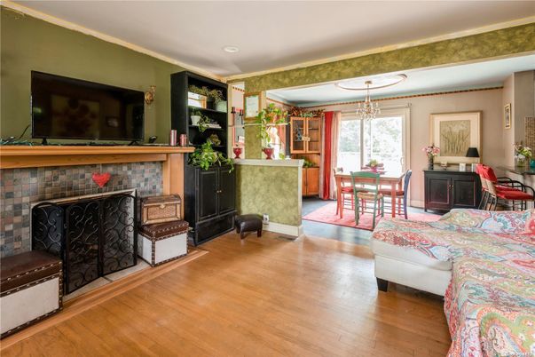 Chandelier, Dining room, Fireplace, Interior, Recessed Lighting, Wood Texture Flooring
