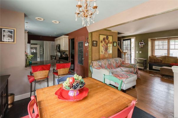 Chandelier, Dining room, Interior, Kitchen, Living room, Recessed Lighting, Stainless Steel Appliances, Wood Texture Flooring