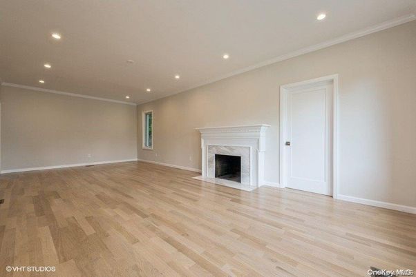 Empty room, Fireplace, Interior, Recessed Lighting, Wood Texture Flooring