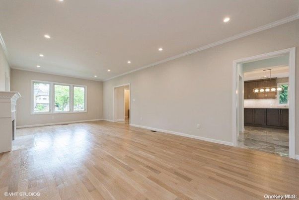 Empty room, Fireplace, Interior, Kitchen, Pendant Lights, Recessed Lighting, Wood Texture Flooring