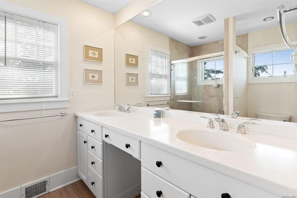 Bathroom, Dual Sink Vanities, Interior, Recessed Lighting, Wood Texture Flooring