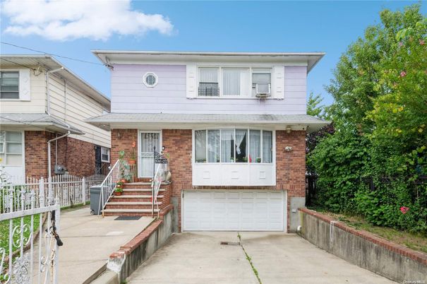 Attached, Exterior, Facade, Brick Facade, American Foursquare