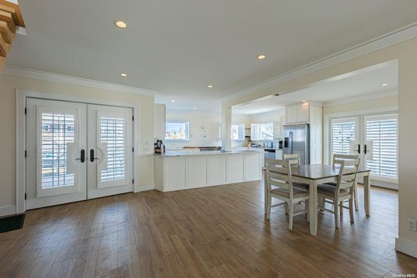 Dining room, Interior, Kitchen, Recessed Lighting, Stainless Steel Appliances, Wood Texture Flooring
