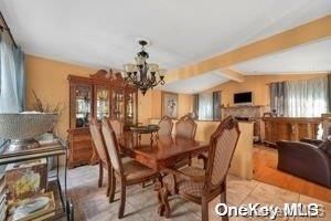 Chandelier, Dining room, Fireplace, Interior, Living room, Wooden Beams