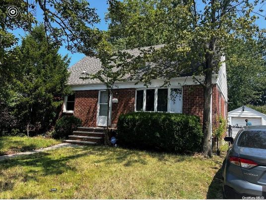 Exterior, Facade, Brick Facade, Cape Cod
