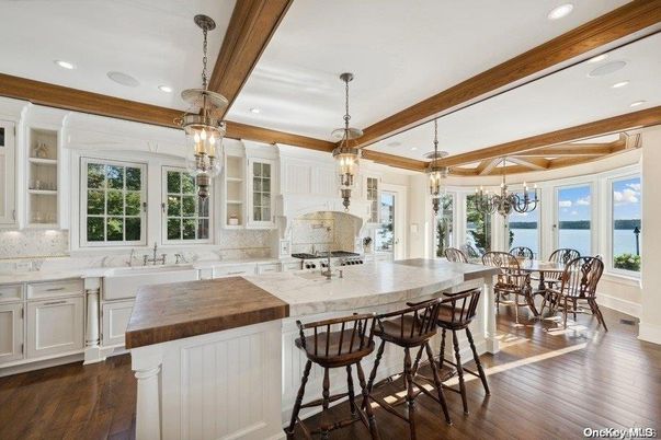 Chandelier, Dining room, Interior, Kitchen, Pendant Lights, Recessed Lighting, Water, Wooden Beams, Wood Texture Flooring