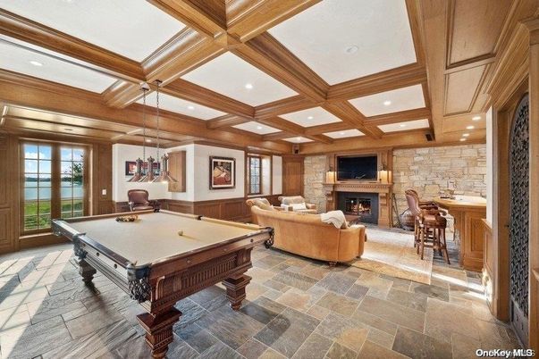 Billiard Table, Fireplace, Game Room, Interior, Living room, Pendant Lights, Recessed Lighting, Stone Walls, Wooden Beams