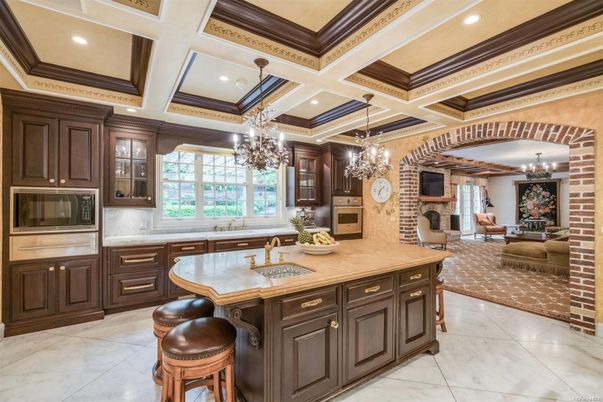 Chandelier, Fireplace, Interior, Kitchen, Living room, Recessed Lighting, Stainless Steel Appliances