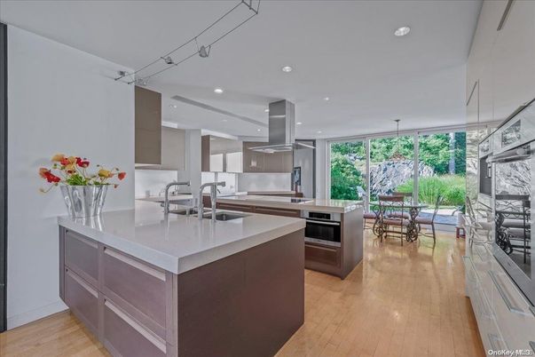 Dining room, Interior, Kitchen, Recessed Lighting, Stainless Steel Appliances, Wood Texture Flooring