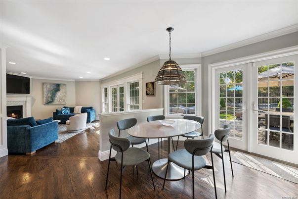 Dining room, Fireplace, Interior, Living room, Pendant Lights, Recessed Lighting, Wood Texture Flooring