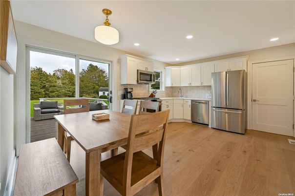 Dining room, Interior, Kitchen, Recessed Lighting, Stainless Steel Appliances, Wood Texture Flooring