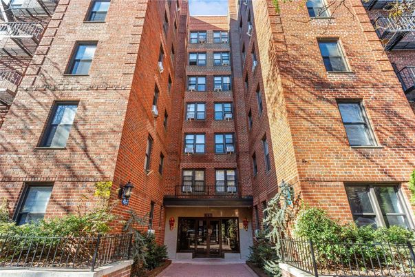 Exterior, Facade, Brick Facade, Condo Building