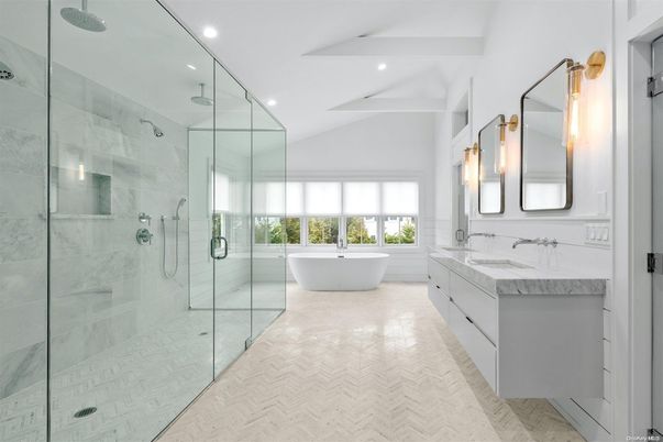 Bathroom, Dual Sink Vanities, Free Standing Baths, Glass Shower, Interior, Marble Walls, Recessed Lighting