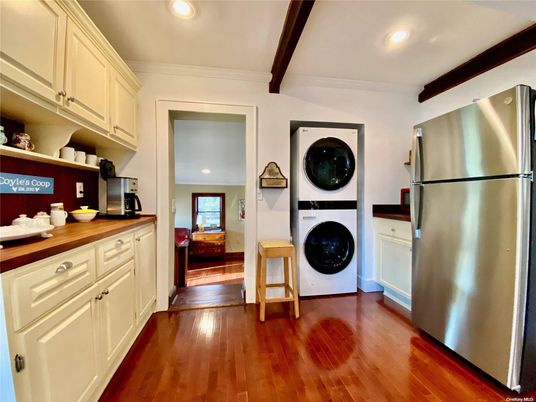Interior, Kitchen, Recessed Lighting, Washer, Wood Texture Flooring