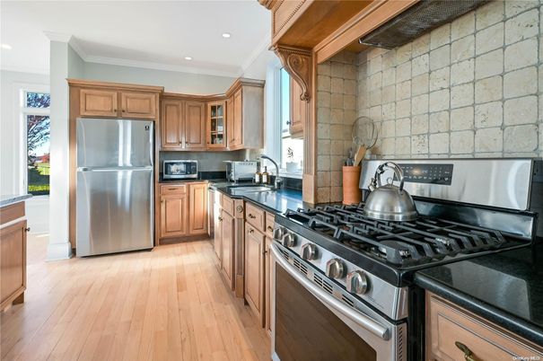 Interior, Kitchen, Recessed Lighting, Stainless Steel Appliances, Stone Walls, Wood Texture Flooring