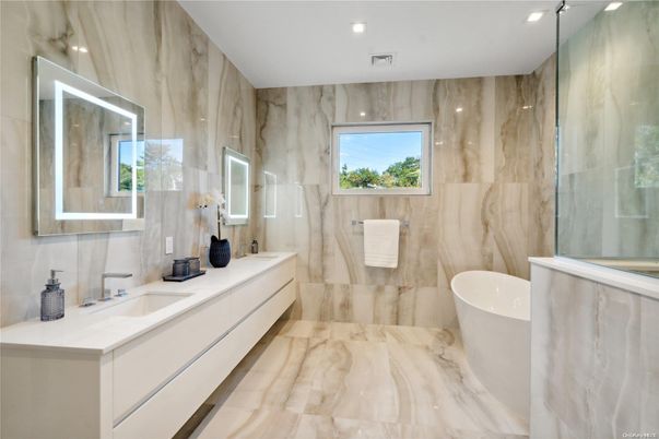 Bathroom, Dual Sink Vanities, Free Standing Baths, Interior, Marble, Marble Walls, Recessed Lighting