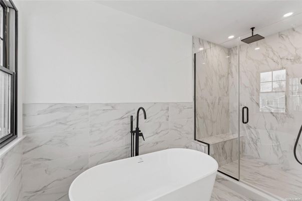 Bathroom, Free Standing Baths, Glass Shower, Interior, Marble, Marble Walls, Recessed Lighting