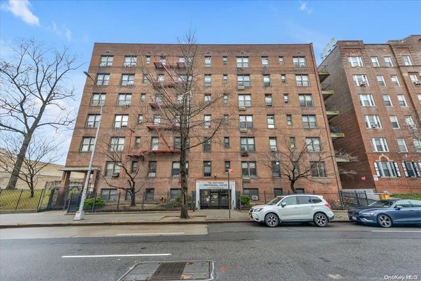 Exterior, Facade, Brick Facade, Condo Building