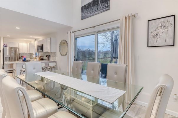 Dining room, Interior, Kitchen, Recessed Lighting, Stainless Steel Appliances, Wood Texture Flooring