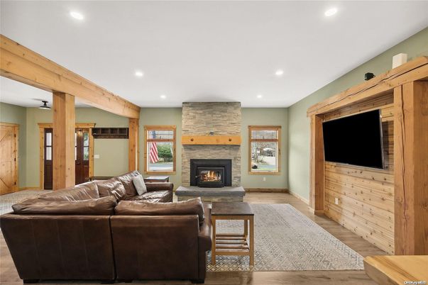 Fireplace, Interior, Living room, Recessed Lighting, Stone Walls, Wood Texture Flooring, Wooden Walls