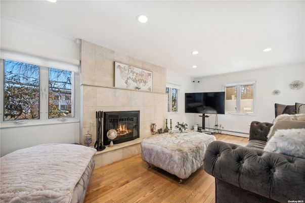 Bedroom, Fireplace, Interior, Recessed Lighting, Wood Texture Flooring