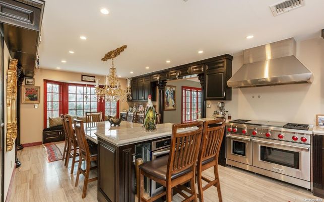 Chandelier, Dining room, Interior, Kitchen, Recessed Lighting, Stainless Steel Appliances, Wood Texture Flooring
