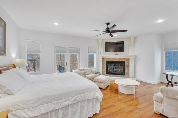 Bedroom, Fireplace, Interior, Recessed Lighting, Wood Texture Flooring