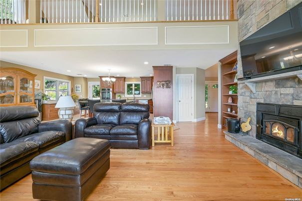Chandelier, Dining room, Fireplace, Interior, Kitchen, Living room, Recessed Lighting, Wood Texture Flooring