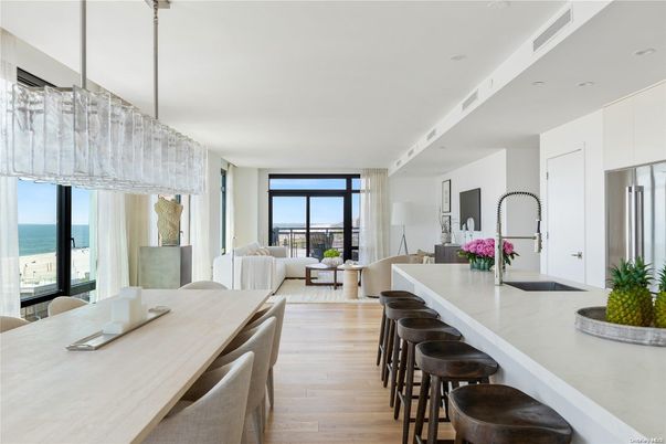 Dining room, Interior, Kitchen, Living room, Recessed Lighting, Stainless Steel Appliances, Water, Wood Texture Flooring
