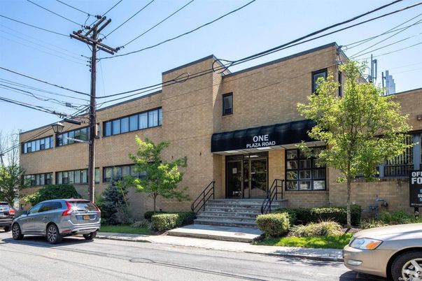 Exterior, Facade, Brick Facade, Condo Building
