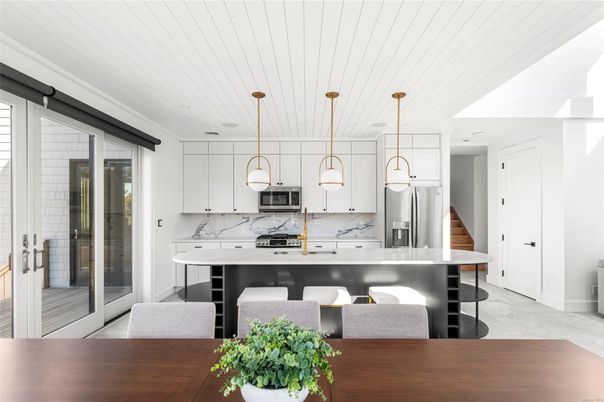Interior, Kitchen, Marble Walls, Pendant Lights, Stainless Steel Appliances