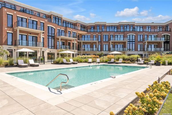 Exterior, Facade, Brick Facade, Pool, Condo Building