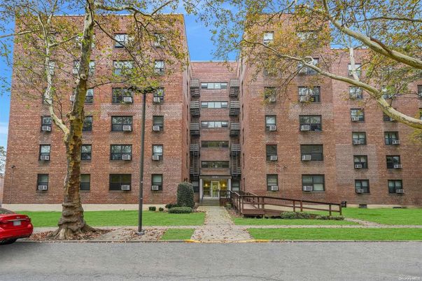 Exterior, Facade, Brick Facade, Condo Building