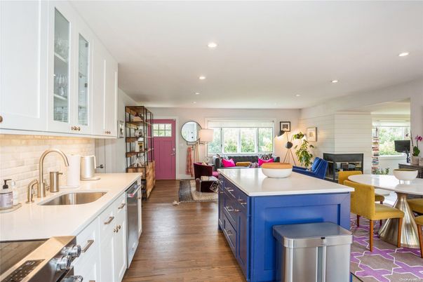 Dining room, Fireplace, Interior, Kitchen, Living room, Recessed Lighting, Stainless Steel Appliances, Wood Texture Flooring