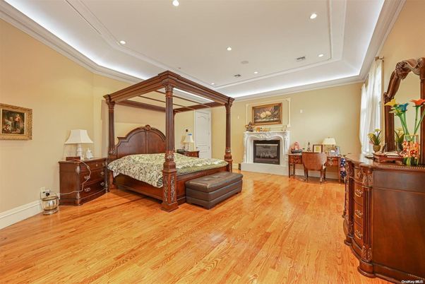Bedroom, Fireplace, Interior, Recessed Lighting, Wood Texture Flooring