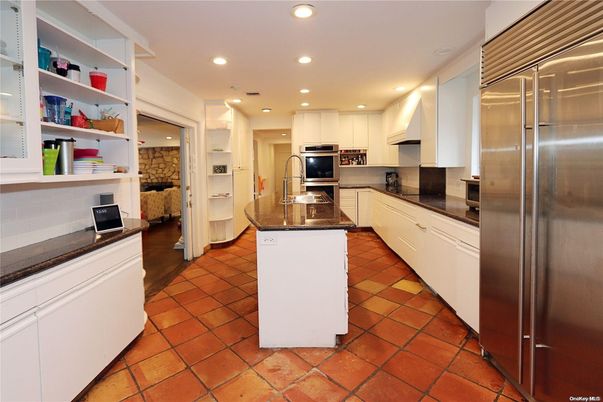 Interior, Kitchen, Recessed Lighting, Stainless Steel Appliances, Stone Walls