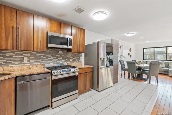 Dining room, Interior, Kitchen, Living room, Recessed Lighting, Stainless Steel Appliances, Wood Texture Flooring