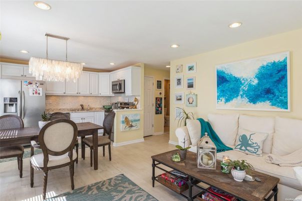Chandelier, Dining room, Interior, Kitchen, Living room, Recessed Lighting, Stainless Steel Appliances, Wood Texture Flooring