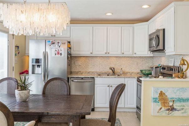 Chandelier, Dining room, Interior, Kitchen, Recessed Lighting, Stainless Steel Appliances
