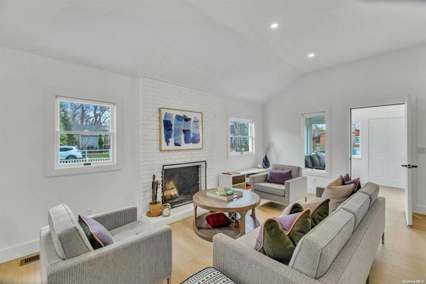 Fireplace, Interior, Living room, Recessed Lighting, Stone Walls, Wood Texture Flooring