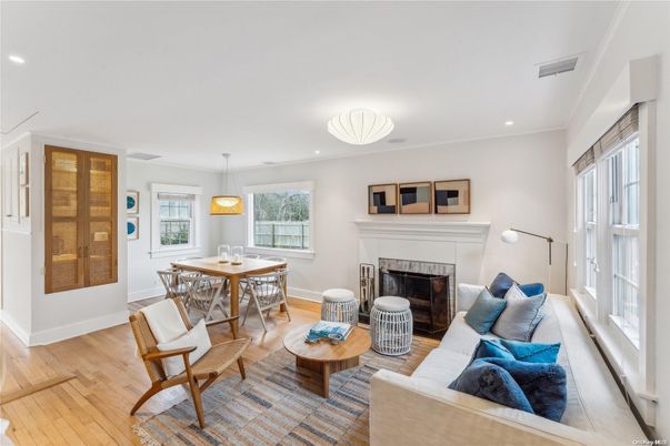 Dining room, Fireplace, Interior, Living room, Pendant Lights, Recessed Lighting, Wood Texture Flooring