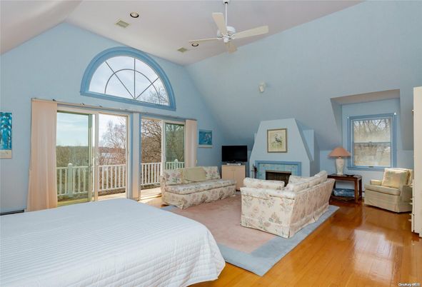 Bedroom, Fireplace, Interior, Recessed Lighting, Wood Texture Flooring