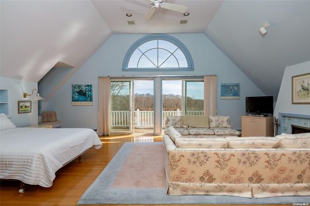Bedroom, Fireplace, Interior, Living room, Recessed Lighting, Wood Texture Flooring
