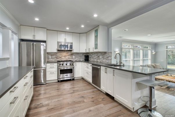 Interior, Kitchen, Recessed Lighting, Stainless Steel Appliances, Wood Texture Flooring
