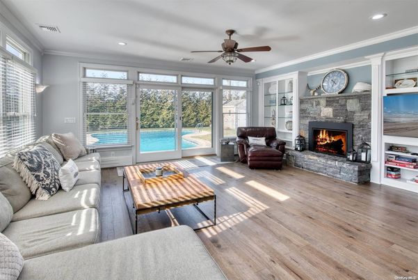 Fireplace, Interior, Living room, Recessed Lighting, Wood Texture Flooring